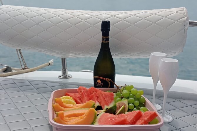 2 Hours Private Boat Tour Isola Bella Taormina Giardini Naxos - Music, refreshments, and the private atmosphere
