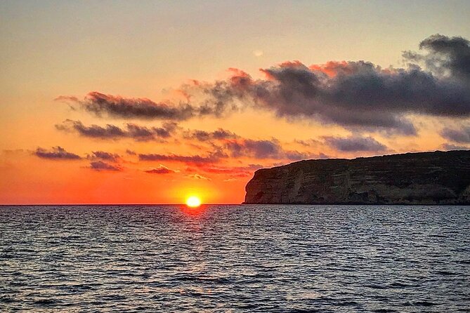 3-Hour Dolphin watching at sunset with aperitif - Sunset near Lampedusa’s bays