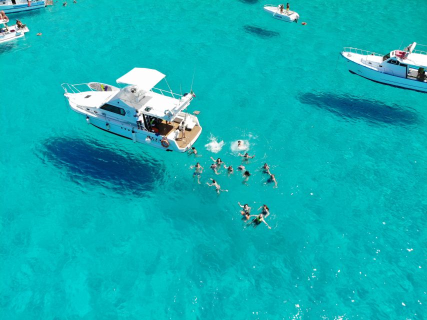 5 hours Lampedusa: Boat Tour with panino SUP e snorkeling - Language, guide style, and group expectations