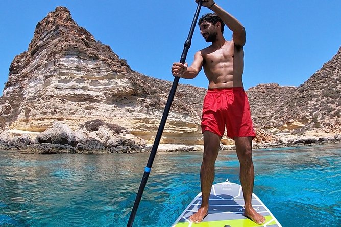7 hours Boat trip to Lampedusa lunch, SUP and Snorkeling - How the wind shapes your day