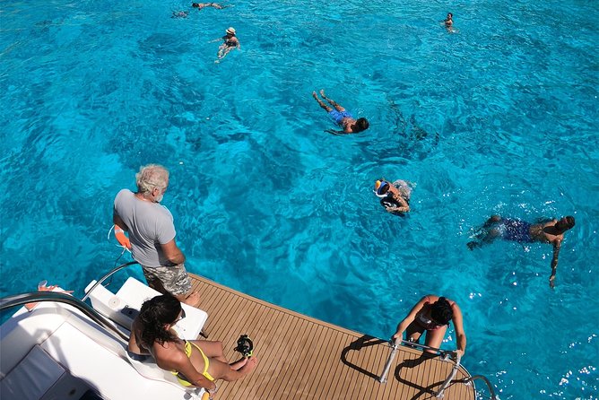 7 hours Boat trip to Lampedusa lunch, SUP and Snorkeling - La Tabaccara and the clear-water stops