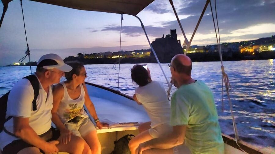 Aci Trezza boat tour sunset and dinner sicilian family home - Ulysses’ caves and the swimming stop