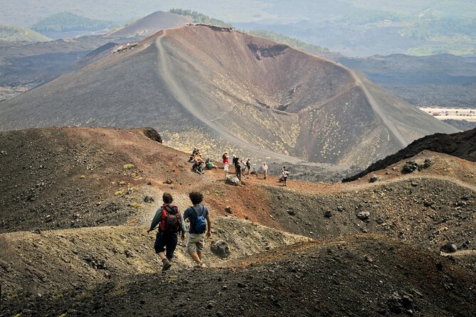 Amazing Etna Morning Tour with Pickup and Drop-Off from Catania - Inside the lava cave with a helmet and flashlight