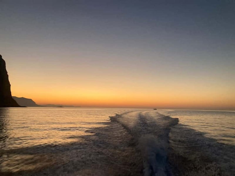Aperitif on a boat at sunset at the Queen Cave - An aperitif with a Sicilian platter