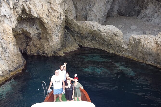 Boat excursion Taormina Giardini Naxos - Passing Scoglio della Croce and the sea caves