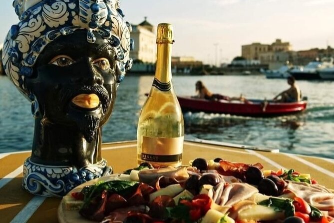 Boat Excursion to Ortigia with Typical Homemade Lunch - Why the sea caves make this more than a standard harbor cruise