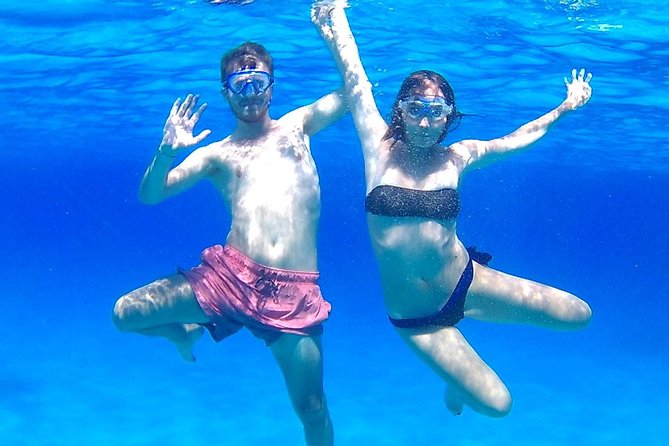 Boat Tour Egadi Day discover Favignana and Levanzo from Trapani - Cala Fredda and Cala Minnola finish with more water time