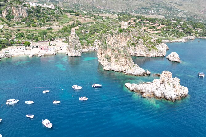 Boat tour to the gypsy reserve and Scopello stacks - Reaching the Scopello Faraglioni