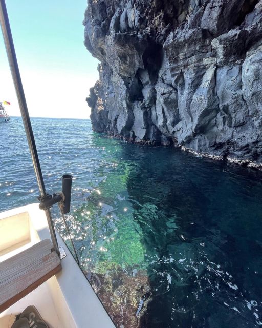 BOAT TOUR WITH APERITIF ON BOARD IN THE CYCLOPS ISLANDS - Setting out from Aci Trezza at sunset