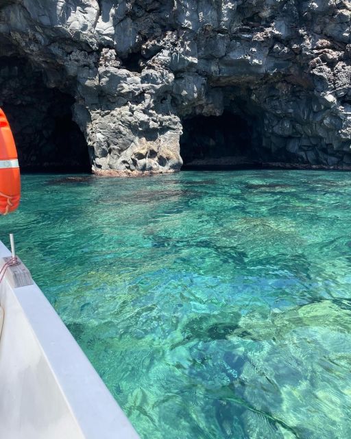 BOAT TOUR WITH APERITIF ON BOARD IN THE CYCLOPS ISLANDS - A swim stop in protected coastal water