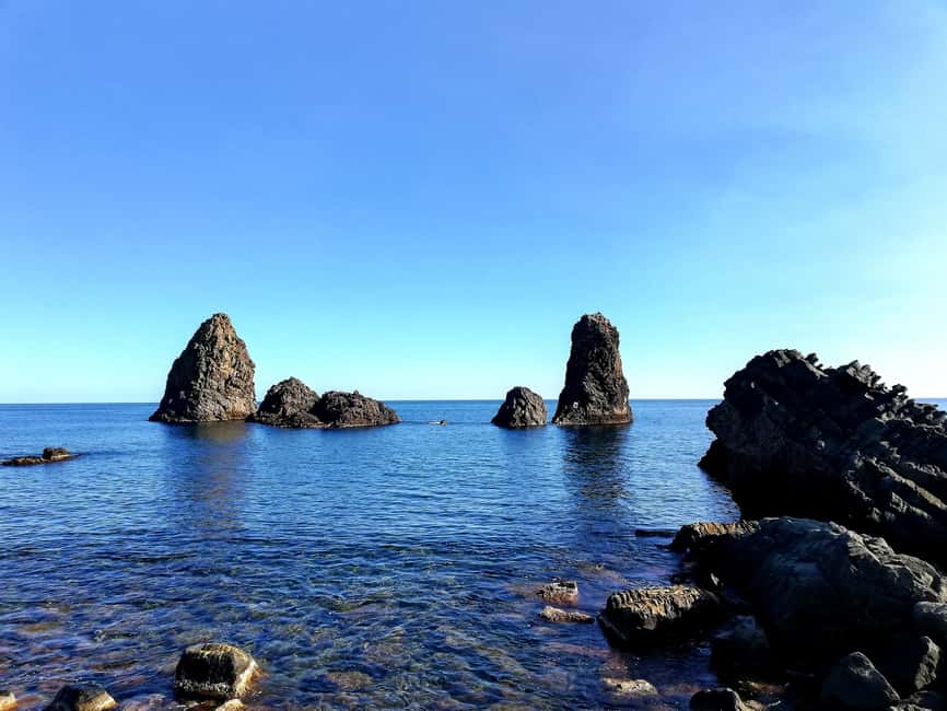 Catania: Cyclops Coast Cruise with Appetizer & Snorkeling - The Cyclopean Isles from the water