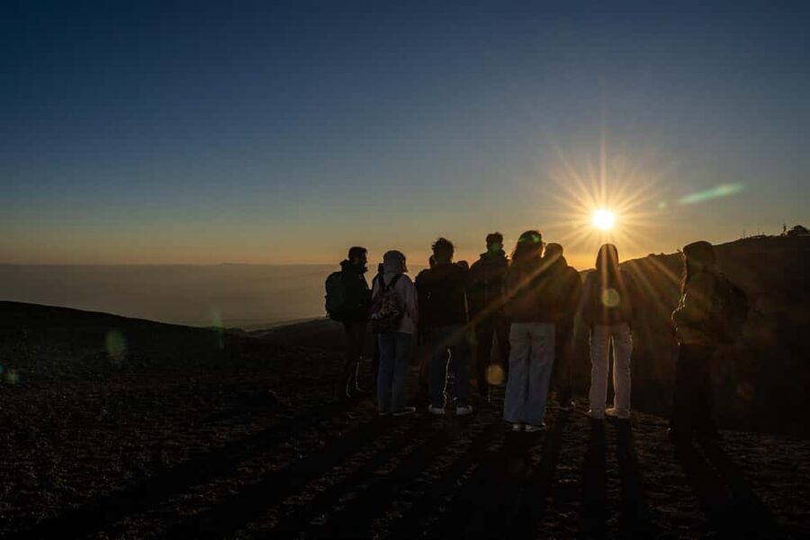 Catania: Etna Sunset Tour with Transfer - Leaving Catania in a small van