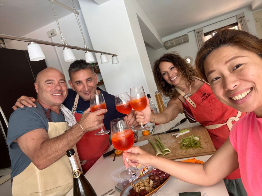 Catania: Market Tour and Cooking Class with Chef Riccardo - Choosing Sicilian wine at a local cantina