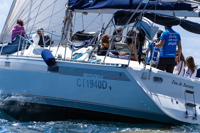 Catania: Sail Cyclops Coast by Boat and Enjoy a Sicilian Aperitif - Aci Trezza and the Faraglioni