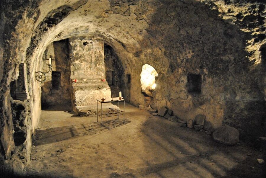 Catania: Underground and Street Food Walking Tour - The cathedral basement and the Amenano River