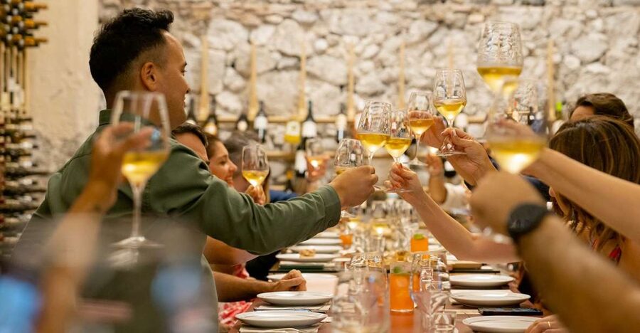 Catania: Volcanic Wine Tasting in a Metropolitan Market - The first pour sets the volcanic theme