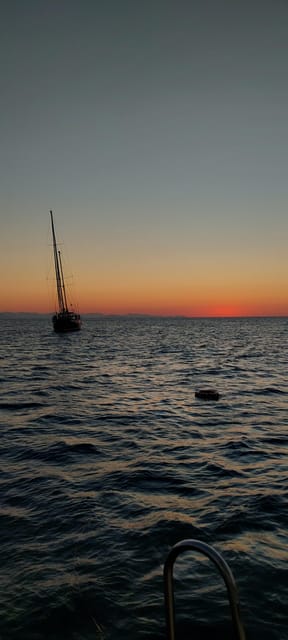 Cefalù: Mini Yacht with Snorkel Stops, Caves and Aperitif - The first coastal views: Cefalù beach and the old town