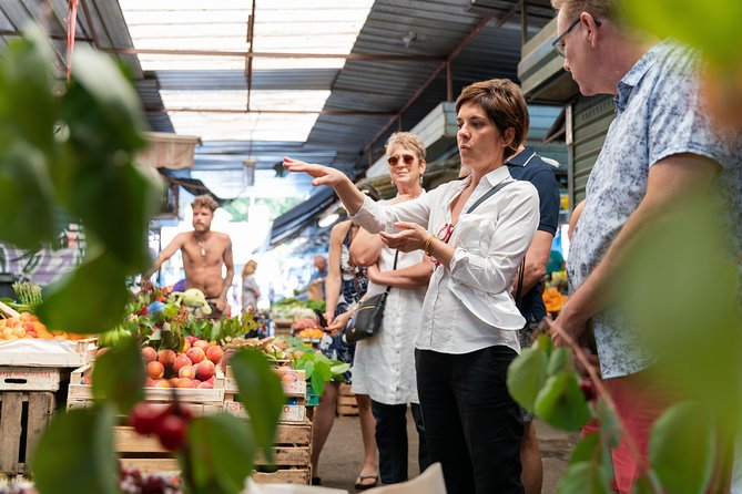 Cesarine: Market Tour & Home Cooking Class in Catania - Moving from food shops to a private home kitchen