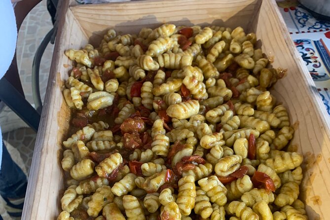 Cook, Eat & Embrace Sicily-An Authentic Cooking Experience - Making fresh pasta with views toward Mount Etna