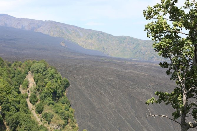 Etna & Alcantara Tour Experience - A volcanic cave with helmet and flashlight