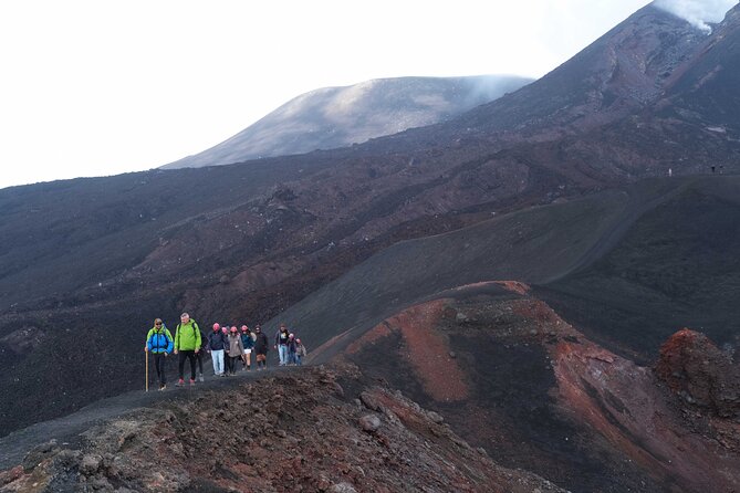 Etna excursion 3000 meters with 4x4 cable car and Trekking - Summit craters, gas plumes, and the walk back down