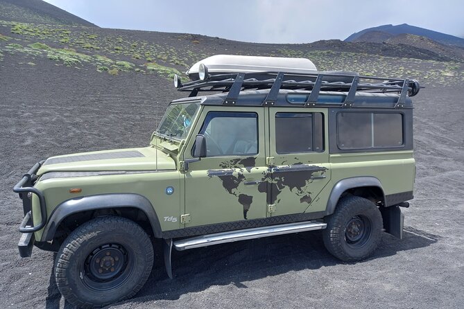 Etna Excursion 4X4 Jeep Tour in the morning - Live an adventure! - Entering a lava cave with helmet and torch