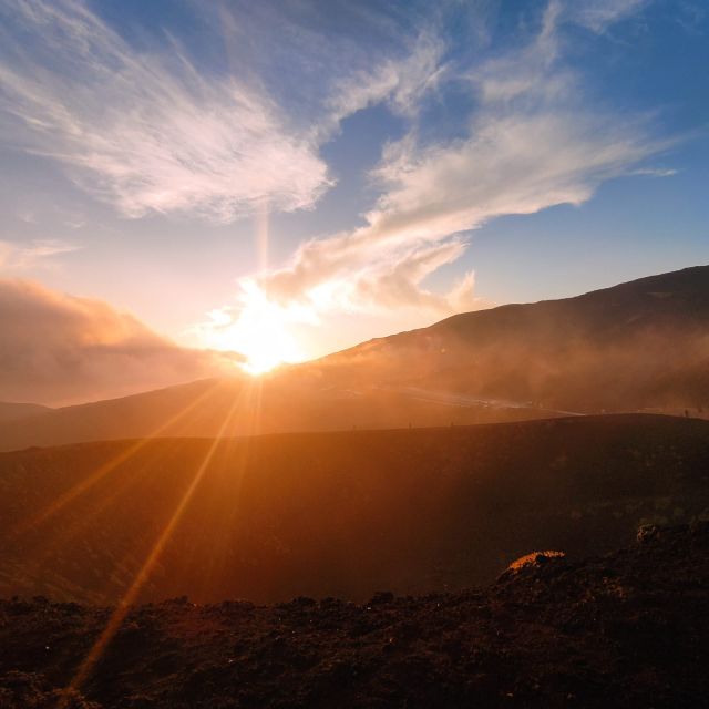 Etna excursions at sunset ancient craters and lava flows - The 2-kilometer trail across lava fields
