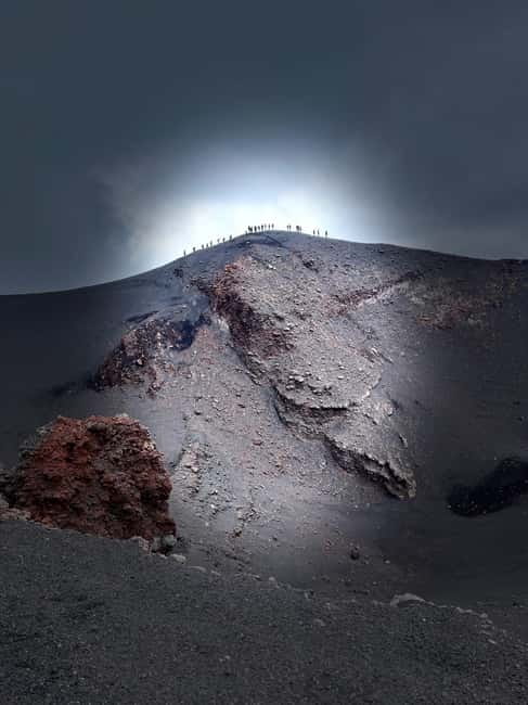 Etna: Summit Area Guided Hike from Cable Car Station - Entering the lava tunnel with a helmet