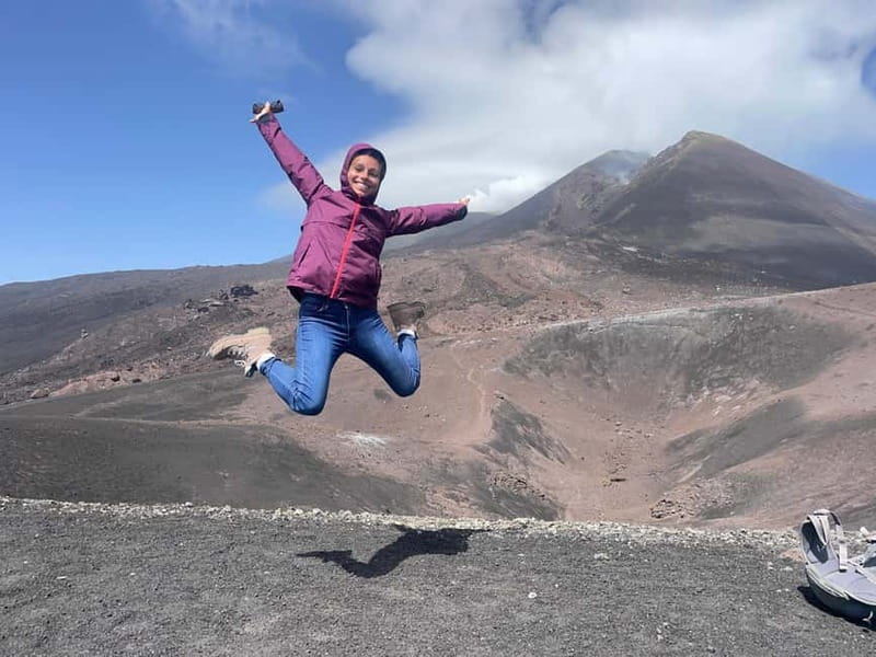 Etna: Summit Area Guided Hike from Cable Car Station - Descending through volcanic sand to the Valle del Bove