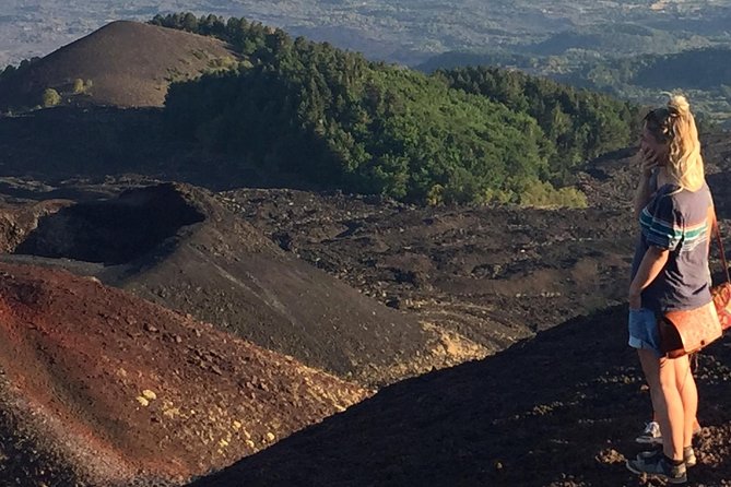 Etna Sunset Tour (starting from Catania) - Entering an old lava cave with helmet and torch