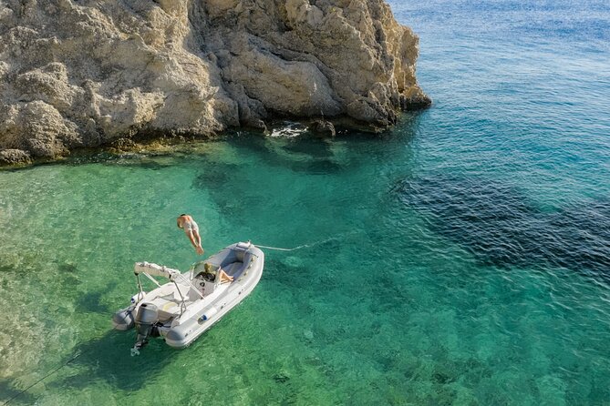 Favignana inflatable boat tour, wine tasting, snorkeling and relaxation - Bue Marino, caves, and sea-shaped quarry walls