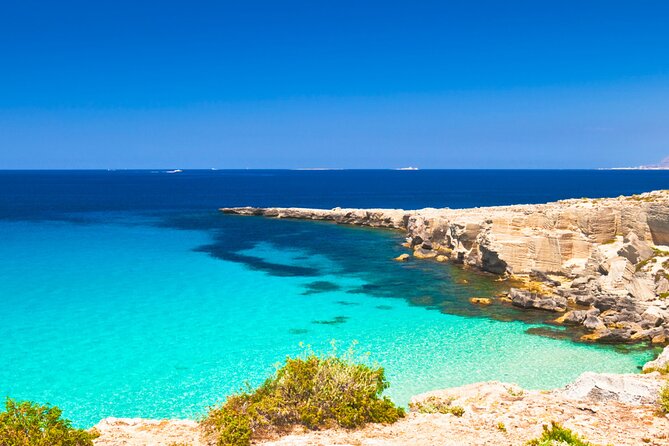 Favignana inflatable boat tour, wine tasting, snorkeling and relaxation - Cala Rossa: swimming beside old stone quarries