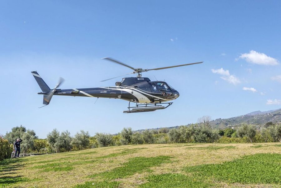 Fiumefreddo: Group Flight Helicopter Tour over Etna - Descending toward Rifugio Sapienza