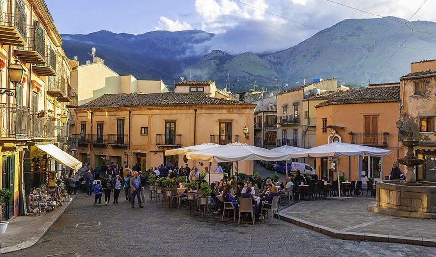 From Cefalù: Authentic Sicilian Villages and Happy Hour - Castelbuono: castle walls, village streets, and panettone