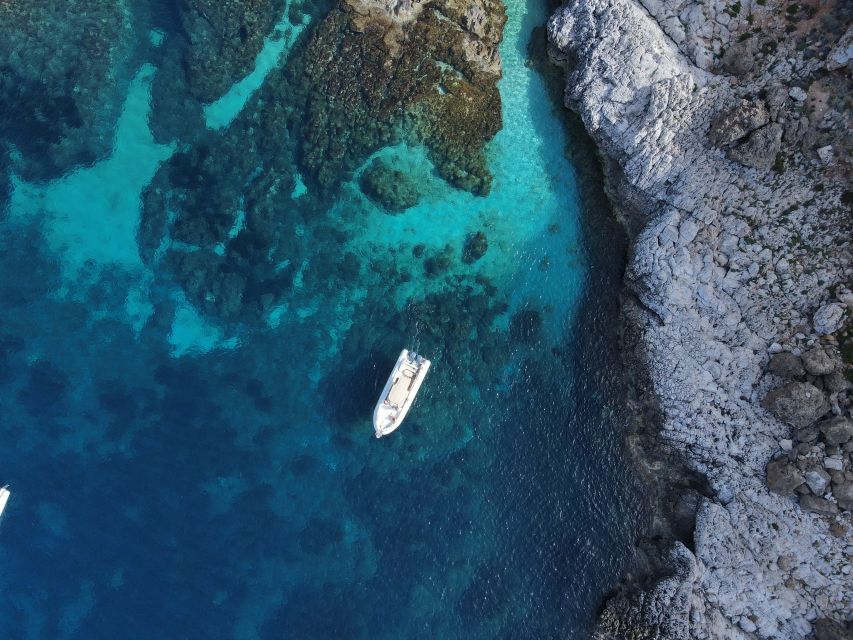 From Trapani: Favignana and Levanzo Full Day Cruise - Sea stacks, Cala Fredda, and Cala Minnola