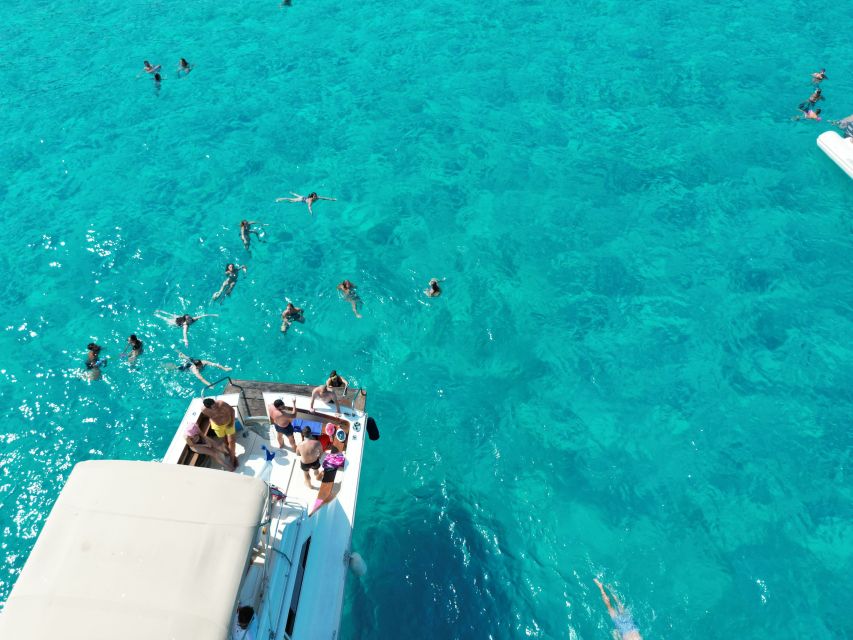 From Trapani: Favignana and Levanzo Yacht Tour with Stops - Favignana from the water