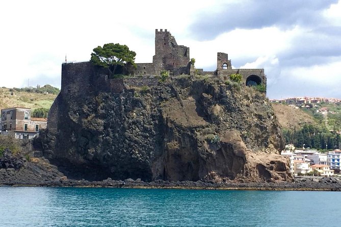 Full Day Sailing Tour Catania-Acitrezza - A relaxed boat day, with a chance to steer