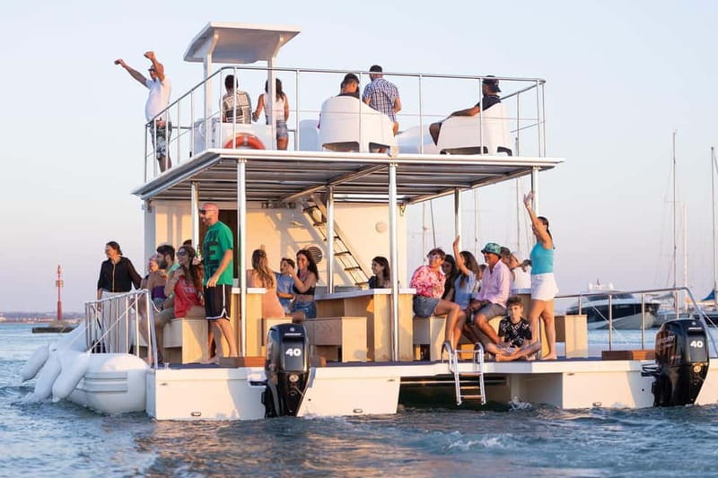 Giardini Naxos: Dolphin Catamaran Sunset Tour with Aperetif - Cruising past Capo Taormina and the sea caves