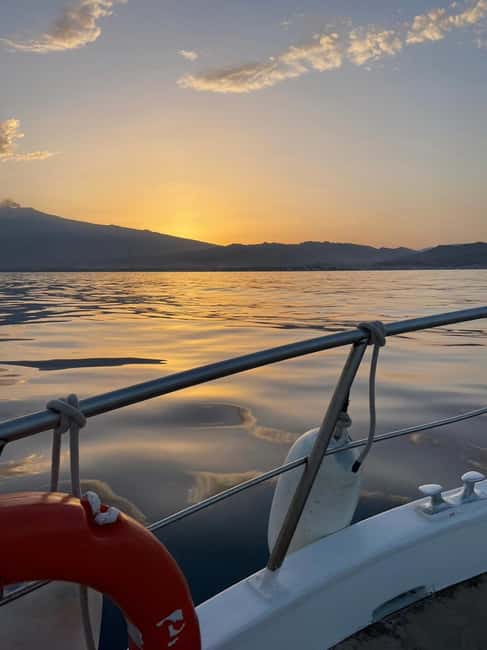 Giardini Naxos: Sunset Dolphin Watching Cruise with Aperitif - Grotta Azzurra and Isola Bella from the sea