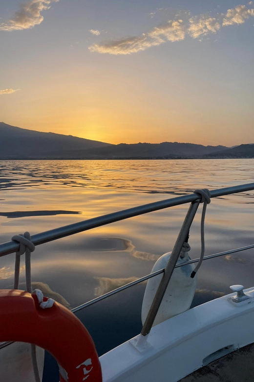 Giardini Naxos: Sunset Dolphin Watching Cruise with Aperitif - Swimming and snorkeling in the clear water