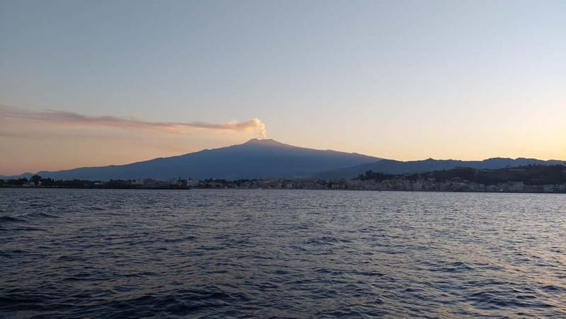 Giardini Naxos Taormina: Dolphin Watching Sunset Tour - Isola Bella from the water