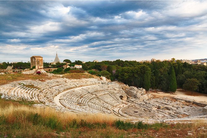 Group guided tour of the archaeological park of Neapolis - The Ear of Dionysius: a cave built for stories
