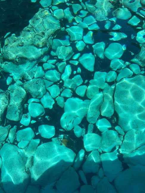Lampedusa: Boat Cruise with Swimming Stops and Italian Lunch - Coves, caves, and changing coastal views