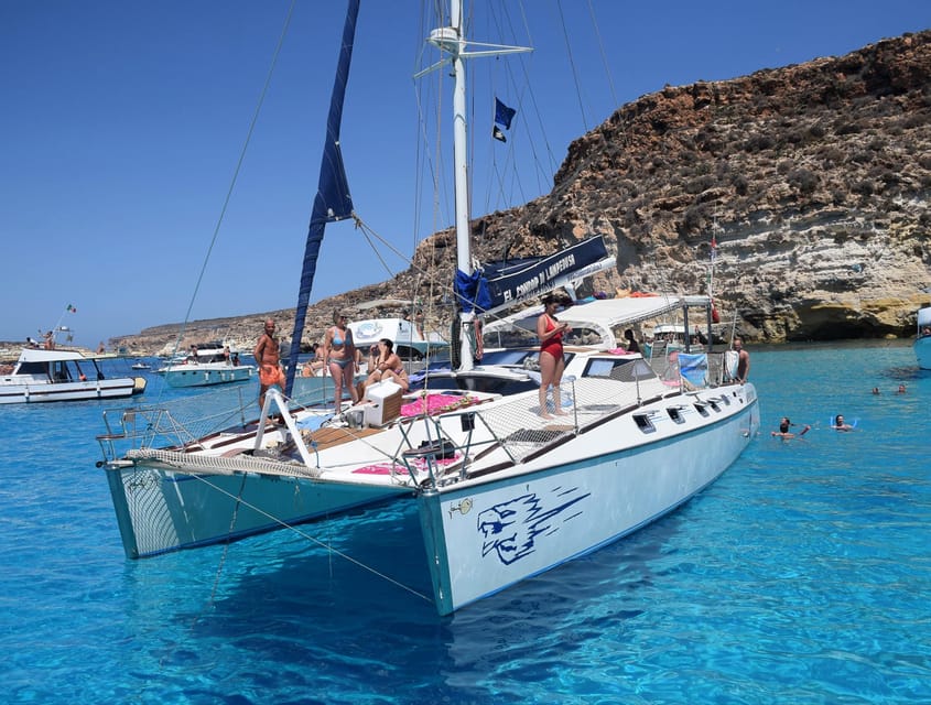 Lampedusa: Dolphin watching with aperitif at sunset - Setting sail from Lampedusa’s port