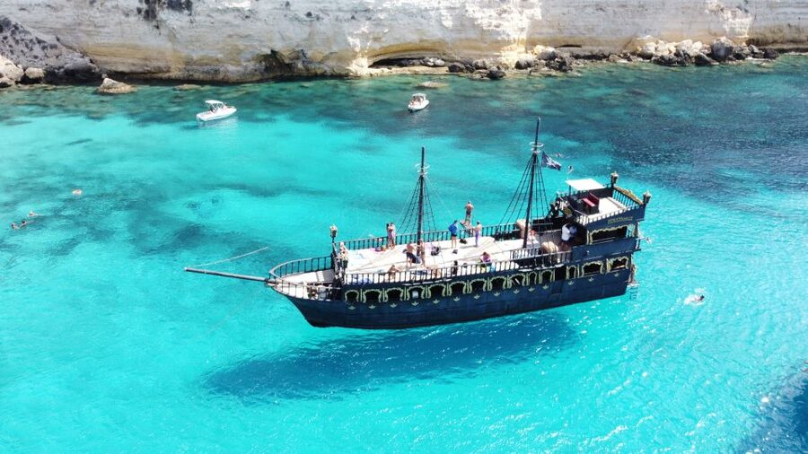 Lampedusa: Pirate Ship Boat Tour with Lunch and Music - Music, crew, and the social mood