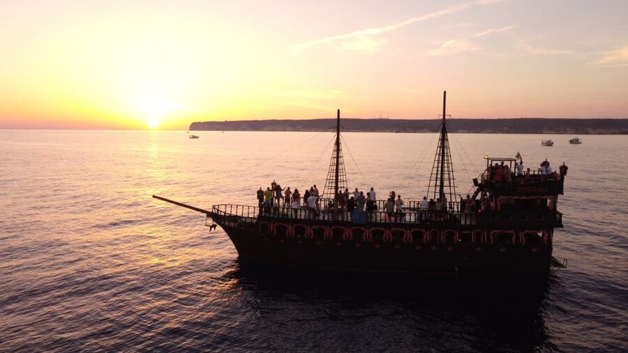 Lampedusa: Sunset Dolphin Sighting on a Pirate Ship - Setting Sail from Favaloro Pier at 17:30