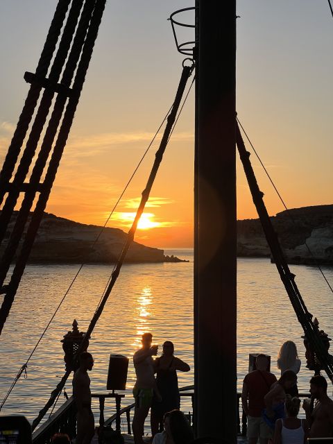 Lampedusa: Sunset Dolphin Sighting on a Pirate Ship - Music, Dancing, and the Galleon’s Social Mood
