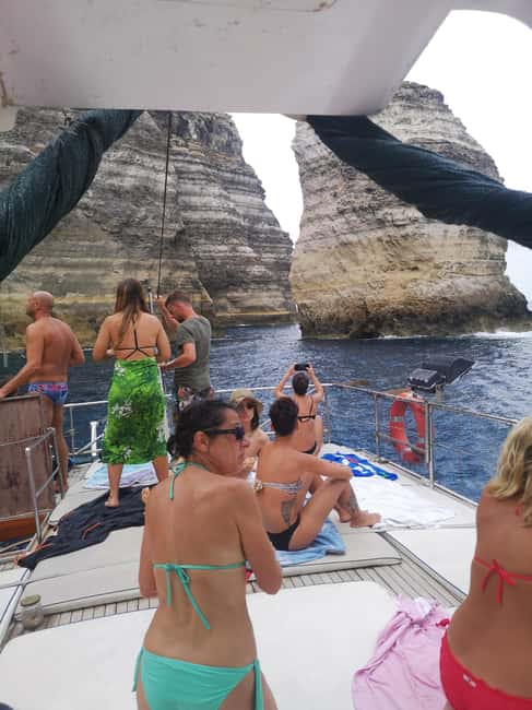 Lampedusa: Yacht excursion, swimming stops and typical lunch - A fish lunch served like a restaurant meal
