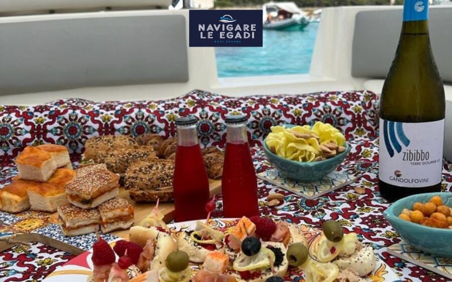 Marsala: Favignana dinghy tour with wine tasting - Cala Rossa, Cala Azzurra, and Bue Marino