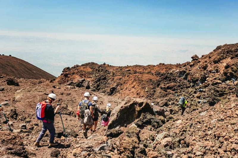 Mount Etna: Summit Trek with Cable Car and snack included - The upper hike and the central crater